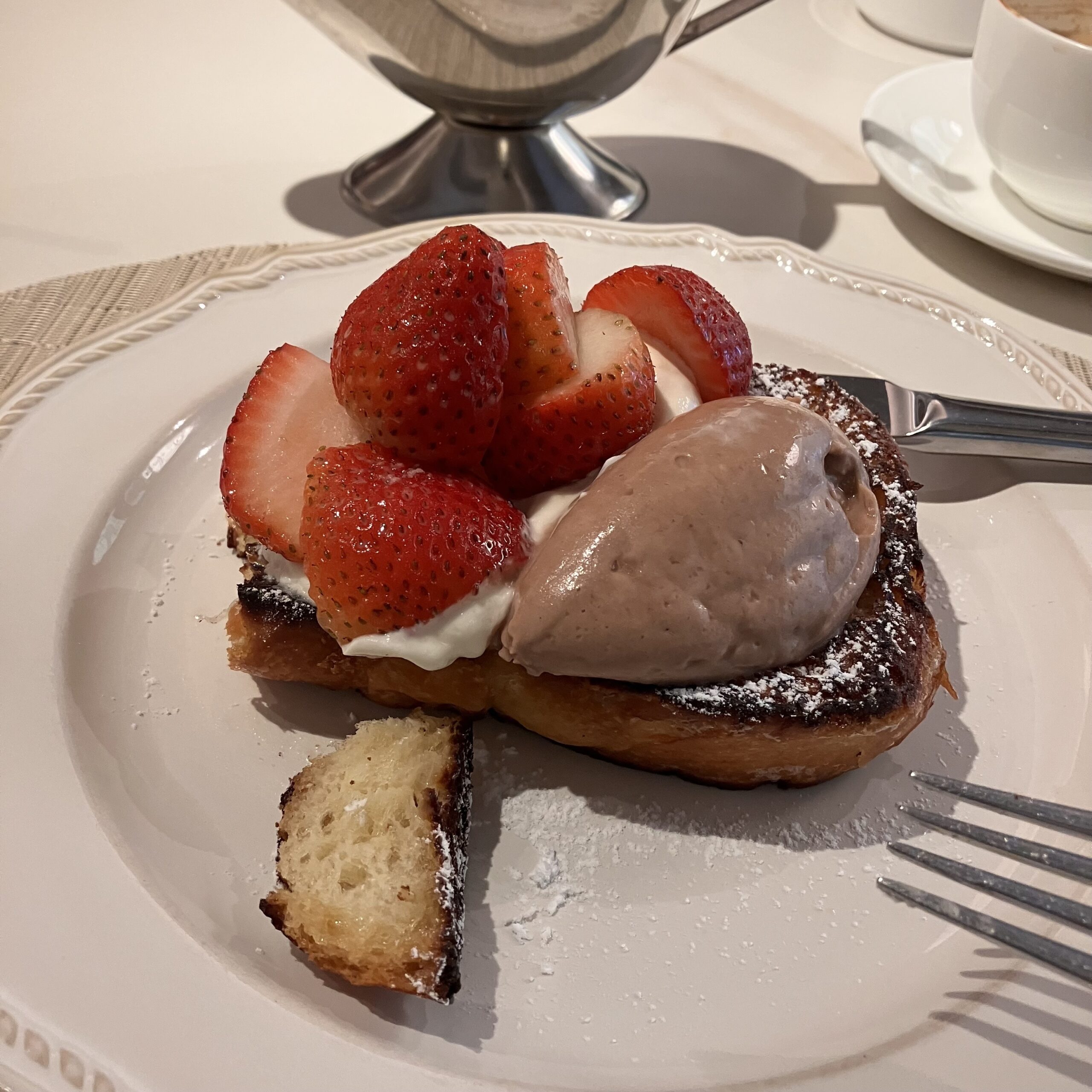 jimmy's kitchen offers the perfect breakfast options in central hong kong like this chocolate french toast with nutella cream and strawberries